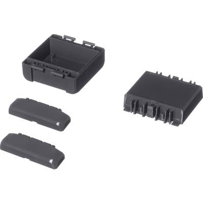 'Four black plastic components, including a rectangular box and three covers, each with different openings and clips.'
