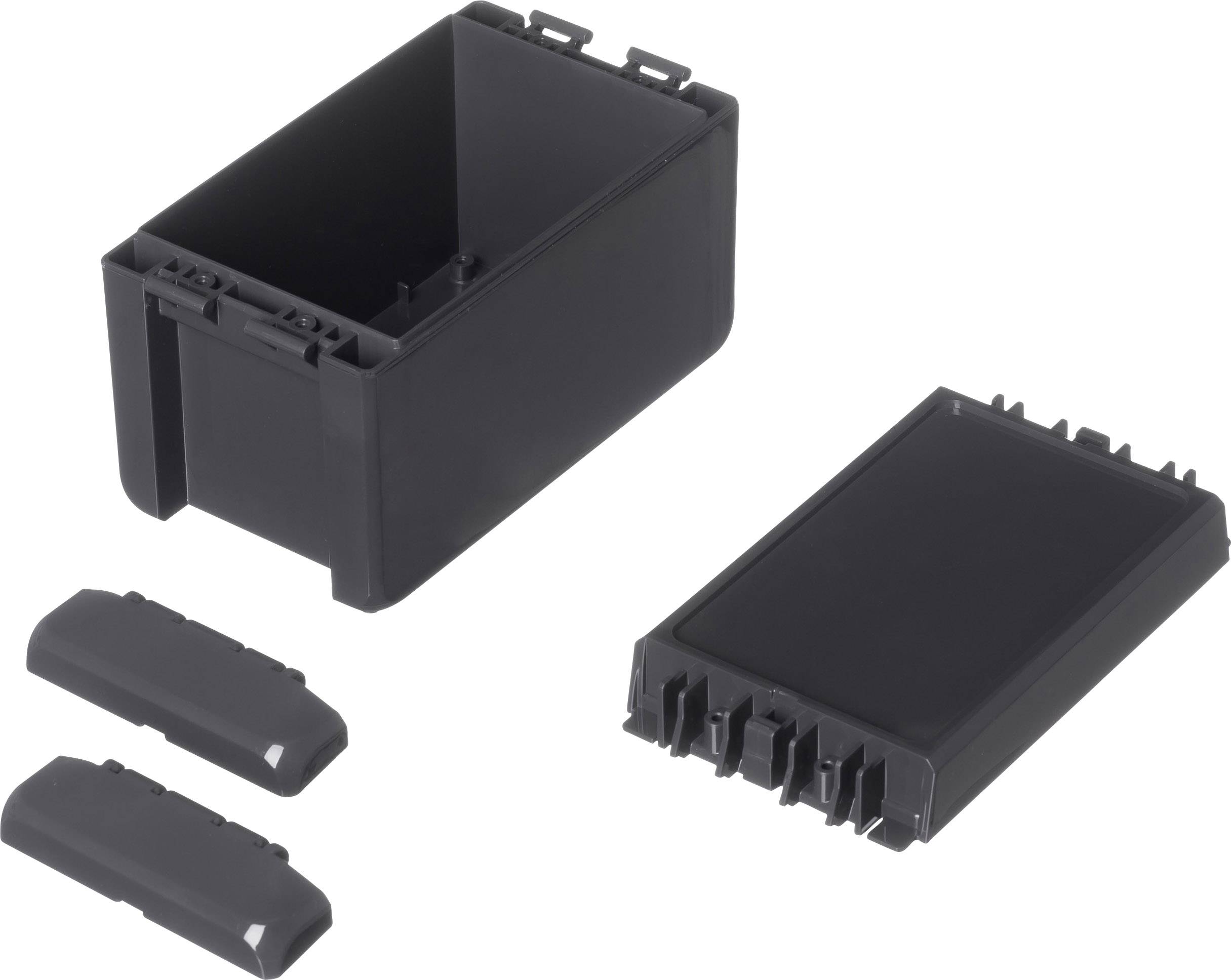 A black, rectangular battery compartment with a removed lid and two side covers assigned to the compartment.