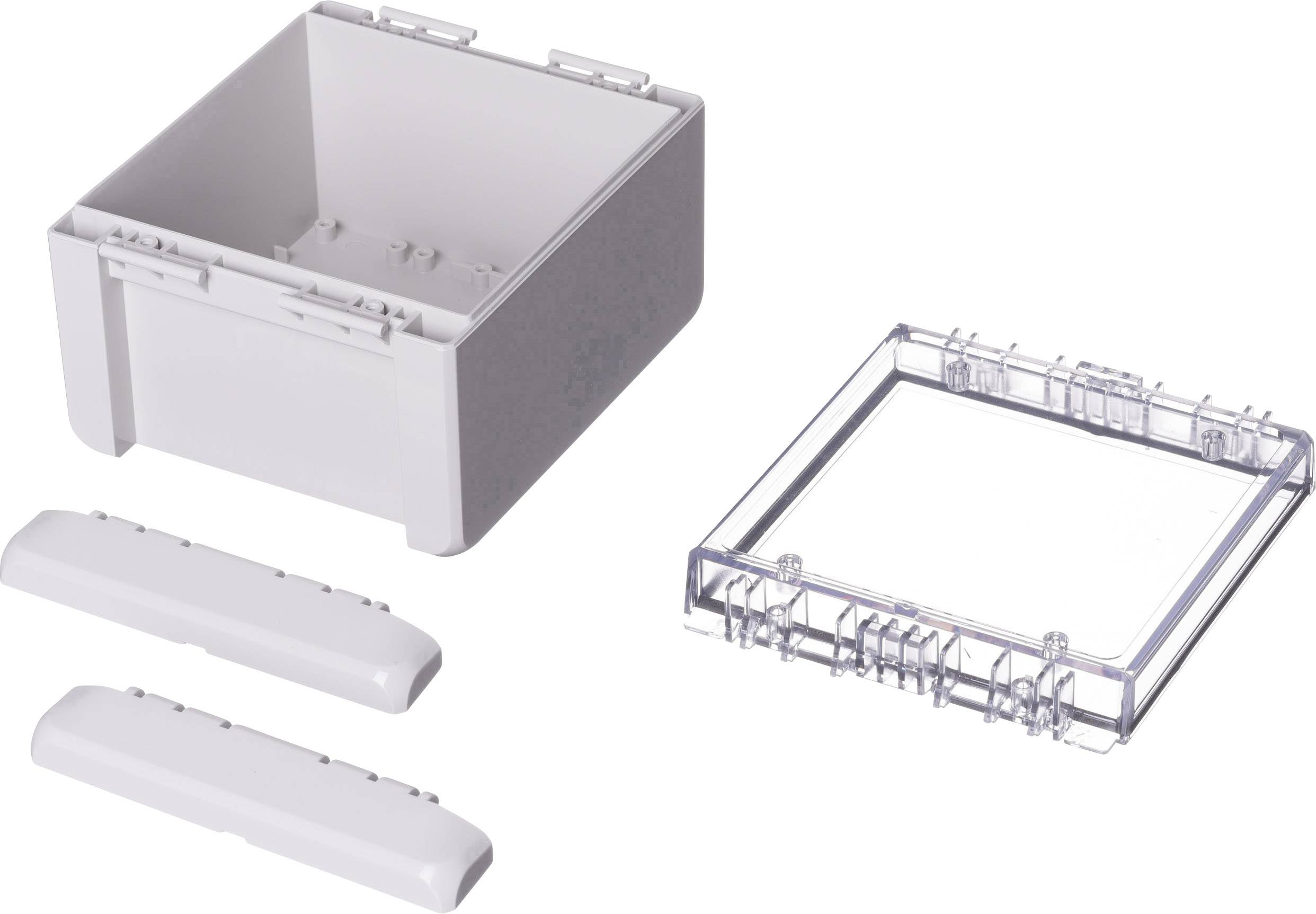 White plastic box, partially open, with transparent lid and two separate white strips.