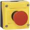 Yellow emergency stop switch housing with red button, square-shaped, secured with four screws. Used for safety in machinery.