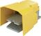 Metal foot pedal in yellow and grey, used for machine control. Protected from accidental activation by surrounding cover.