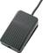 A black foot pedal with a ribbed surface and connected cable, against a white background.