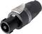 Black plug connector with a round metal locking mechanism and ribbed grip; used for connecting audio devices.