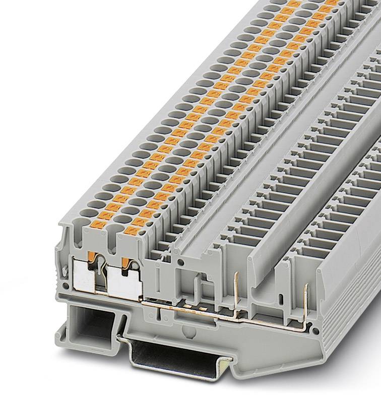 A grey multi-level terminal block with orange contacts, used for electrical wiring in control cabinets.