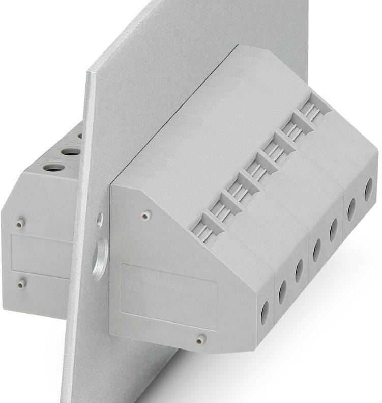 Grey multi-pole connector on a metal plate, part of an electrical or electronic device, showing connections.