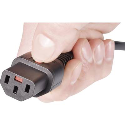A hand is holding a black plug that is ready to be inserted into a matching socket.