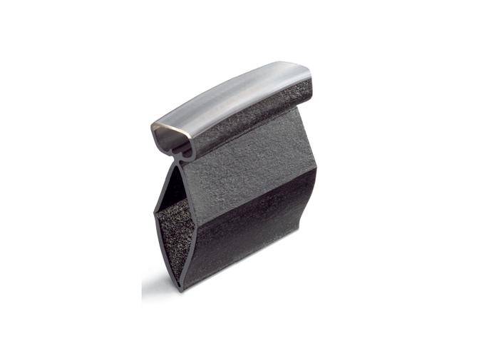 A metallic component with a curved, polished surface and a matte, textured base.