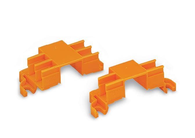 Two orange plastic parts with a rectangular shape and side hooks. They appear to be complementary mounting brackets or spacers.