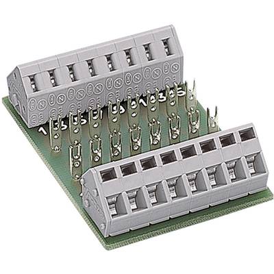 A green printed circuit board with two grey terminal blocks used for electrical connection of various components.
