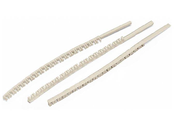 Three white spiral cable ties in different lengths and widths lined up side by side. They are used for bundling and organising cables.