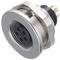 A round, silver-coloured metal plug with multiple golden pins, suitable for electrical connection in devices.