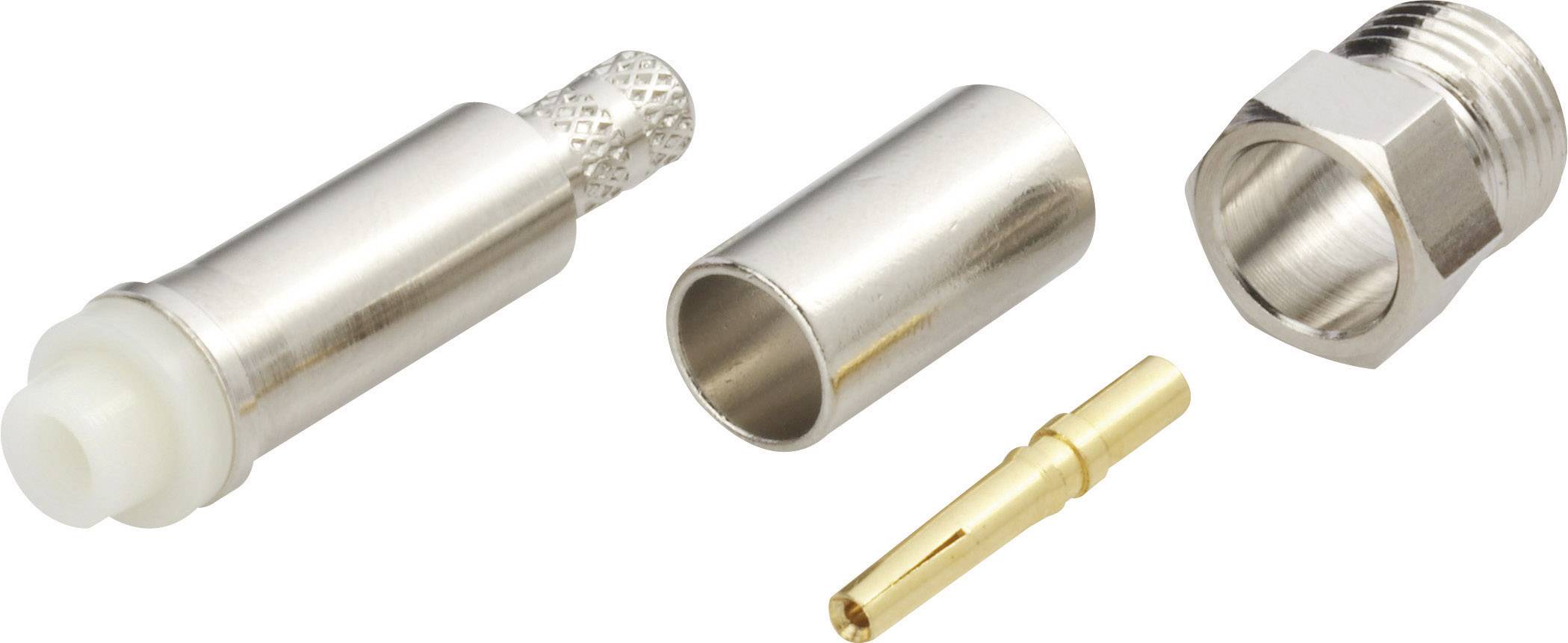 Four cable plug components, including a silver casing and a golden contact pin, are lying side by side on a white surface.