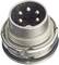 A round metal plug with five pins, used for electronic connections.