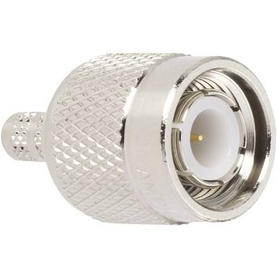 A silver coaxial plug with a ridged surface and a circular opening for connecting cables to electronic devices.