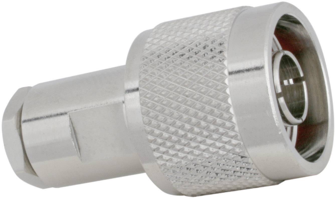 A silver metal plug with a ridged surface and circular connection. Technical accessory component, possibly a coaxial connector.