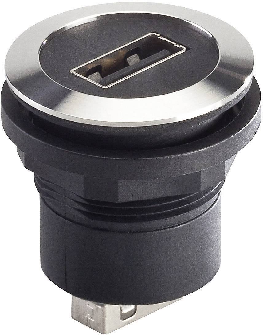 Close-up of a round, black USB socket with a silver rim, built into a black casing.
