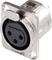 A silver, rectangular XLR plug with three round holes and a 'PUSH' button to release the connection.