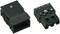 Two black plastic plugs lying side by side on a white background. The one on the left has a cover flap, the one on the right does not, both showing three socket slots.