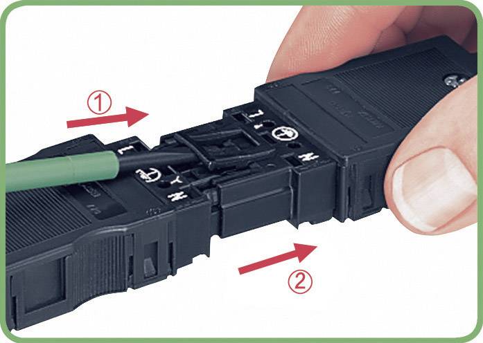 A hand demonstrates the connection of a plug connector. A finger points to the terminal marking 'N', and an arrow indicates the insertion direction.