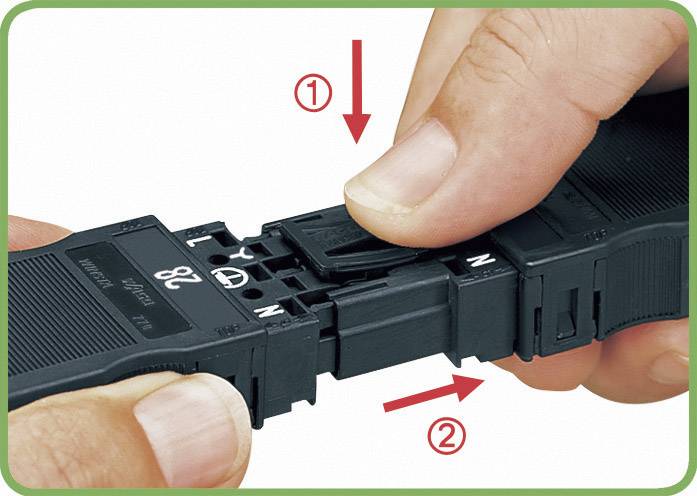 Two hands are assembling an electrical component. Arrows indicate the insertion direction. A red arrow at the top points downwards, a red arrow at the bottom points to the right.