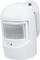 A white motion sensor with a curved design, mounted on a wall bracket. A small red light is located at the bottom.