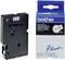 A black Brother P-touch labelling tape (Model TC-291) next to its packaging. Text: 'BLACK WHITE', width: 9 mm.