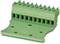 Green electrical terminal block with multiple connection terminals, showing a semi-circular base with holes for mounting.