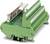 Green electrical terminal block with numbered connection slots, used for connecting electronic components in control cabinets.