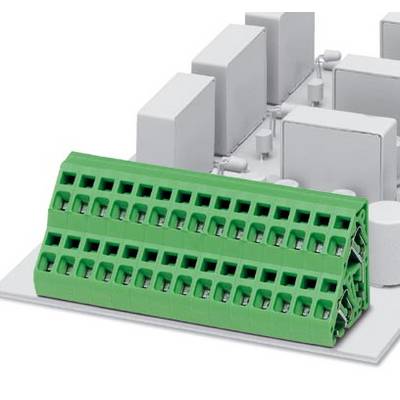 Green electrical connector element on a grey circuit board, positioned between electronic housings. Used for connecting electronic components.