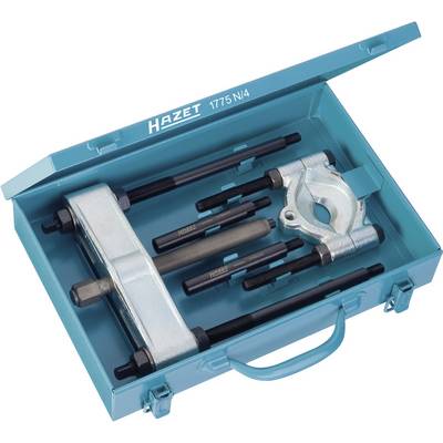 Metal case with a puller set, including screws and mounting jaws. Tool arrangement for mechanical work.