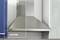 'Cooker hood with the label "before" in the bottom left of the image. The hood is made of stainless steel and is located in a kitchen.'