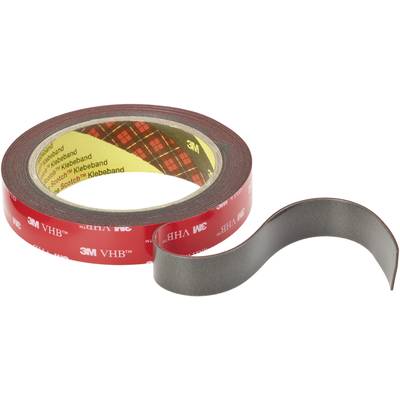 Roll of double-sided adhesive tape on a red spool, with text '3M VHB' and 'Scotch' adhesive tape. A cut piece lies in front of it.