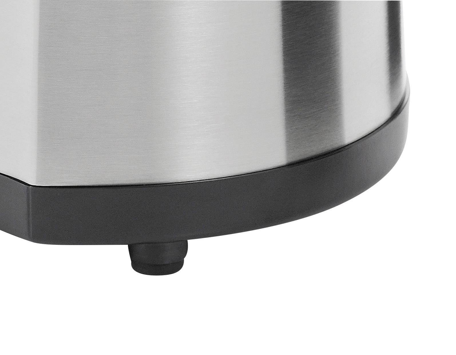 Lower part of a stainless steel device with a black base and rubber feet.