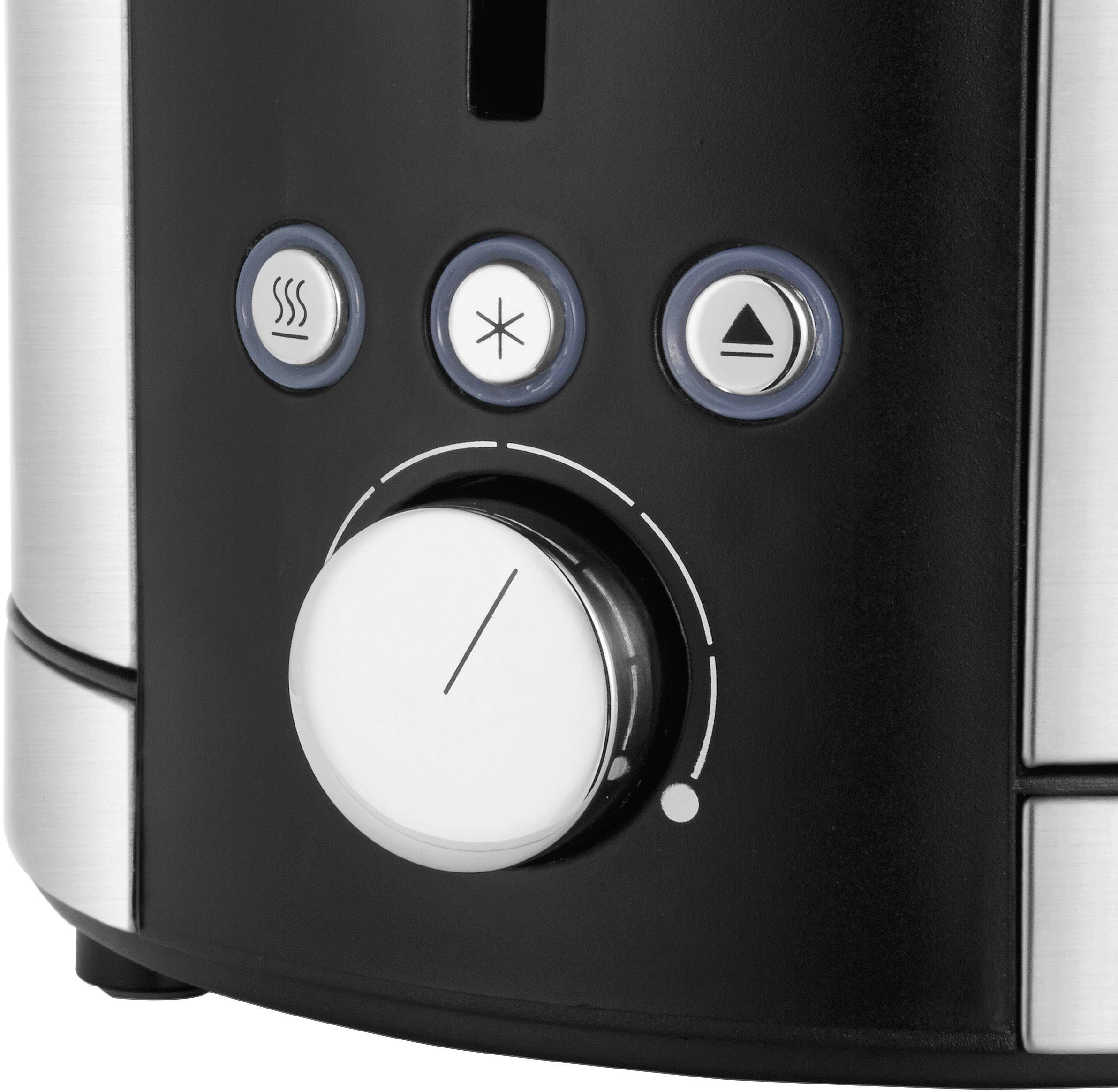Close-up of a toaster, showing three buttons with symbols for reheating, defrosting, and stop, along with a large dial for adjusting the browning level.