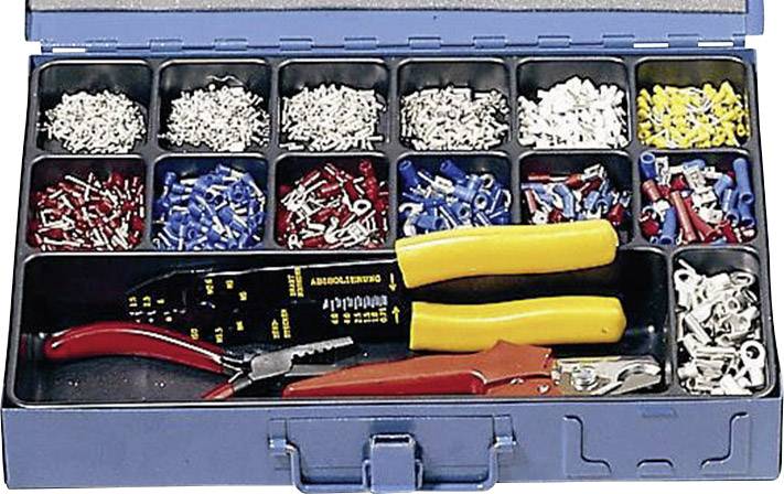 An open toolbox with various cable shoes and connectors arranged in compartments. Two pliers and a wire stripper are lying in the box.