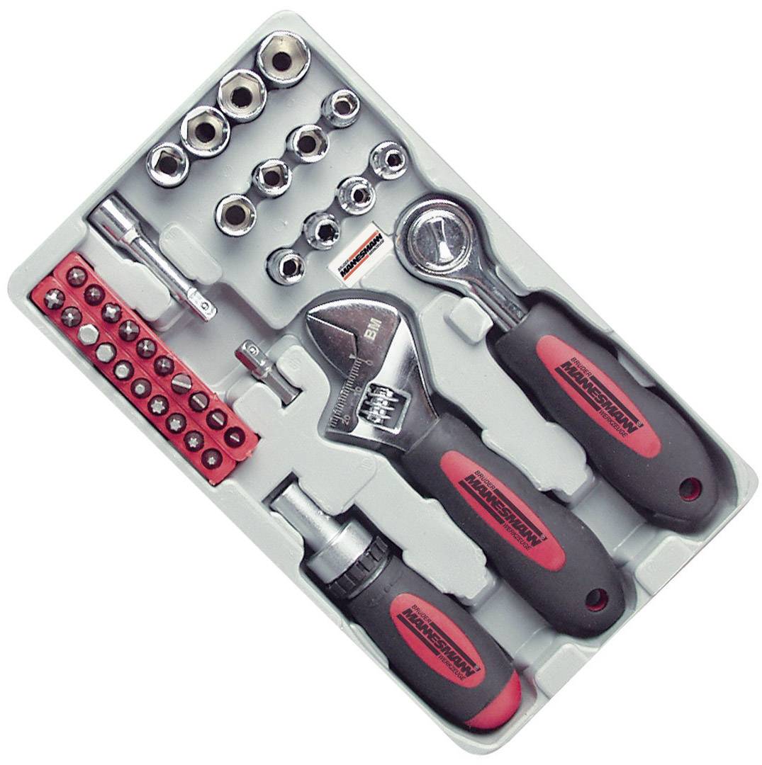 A tool set in a white box, containing spanners, screwdrivers, socket wrenches and bits.