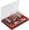 A screwdriver set with various attachments in an open red and black box. Perfect for precise repairs.