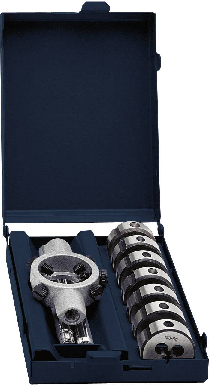 Open blue metal case with internal components of a measuring device and several round, riveted metal pieces.