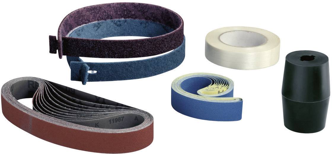 Various sanding and polishing bands, rolls and a sanding tool are laid out on a surface.