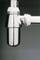 A gleaming, chrome-plated waste pipe in a bathroom or kitchen, visible against a plain, grey background.