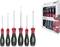 Five screwdrivers of various sizes with red and black handles, alongside packaging with product information.