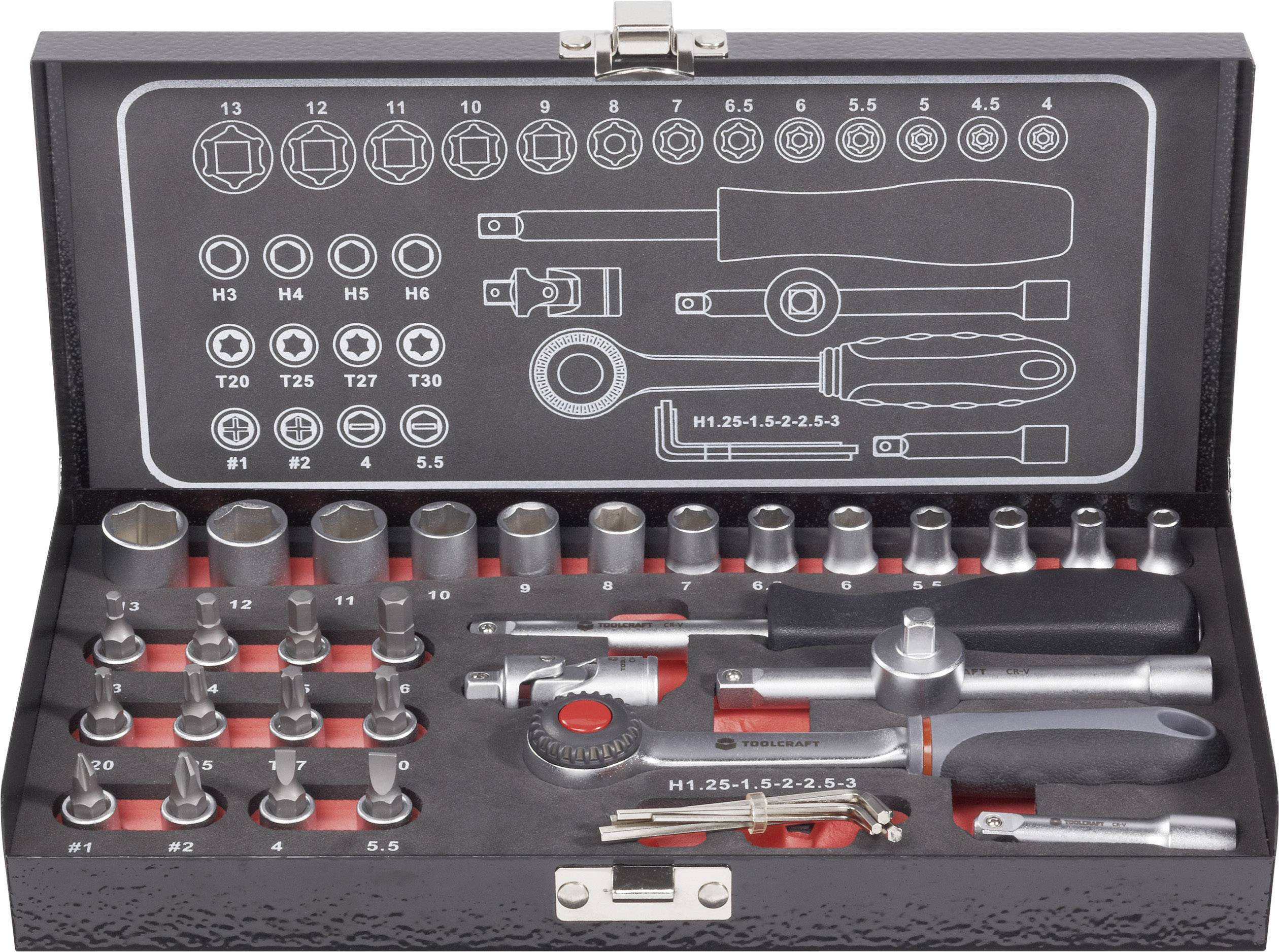 Screwdriver set in an open box. Various bits and tools neatly arranged on red inserts.