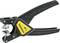 Black and yellow wire stripper with an ergonomic handle. Used for removing insulation from cables during electrical work.