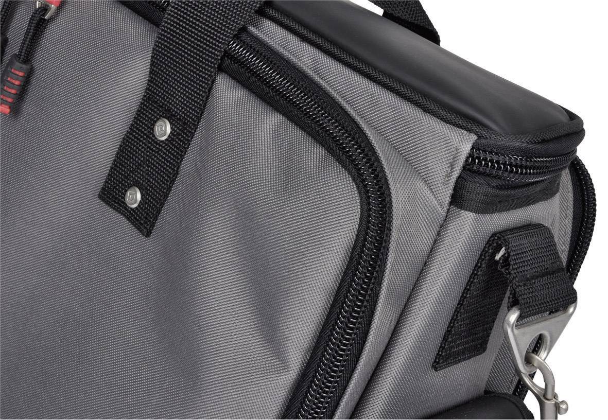 Grey fabric bag with a black zip and carry strap. The bag has metal poppers and a structured edge design.