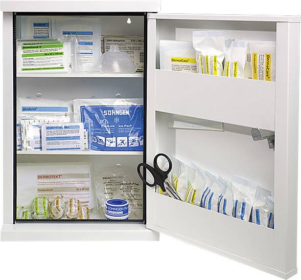 An opened first aid cabinet displays dressings, plasters, and scissors, neatly arranged on shelves and inner doors.