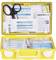 Yellow first aid kit with an open lid. Contains scissors, dressing materials and plasters. Standard-compliant equipment for emergencies.