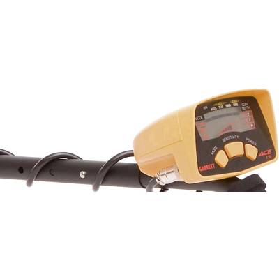 A metal detector with a screen displaying settings such as sensitivity and performance.