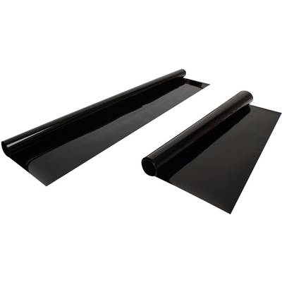 Two black film rolls lying side by side on a white surface. One roll is noticeably larger than the other.