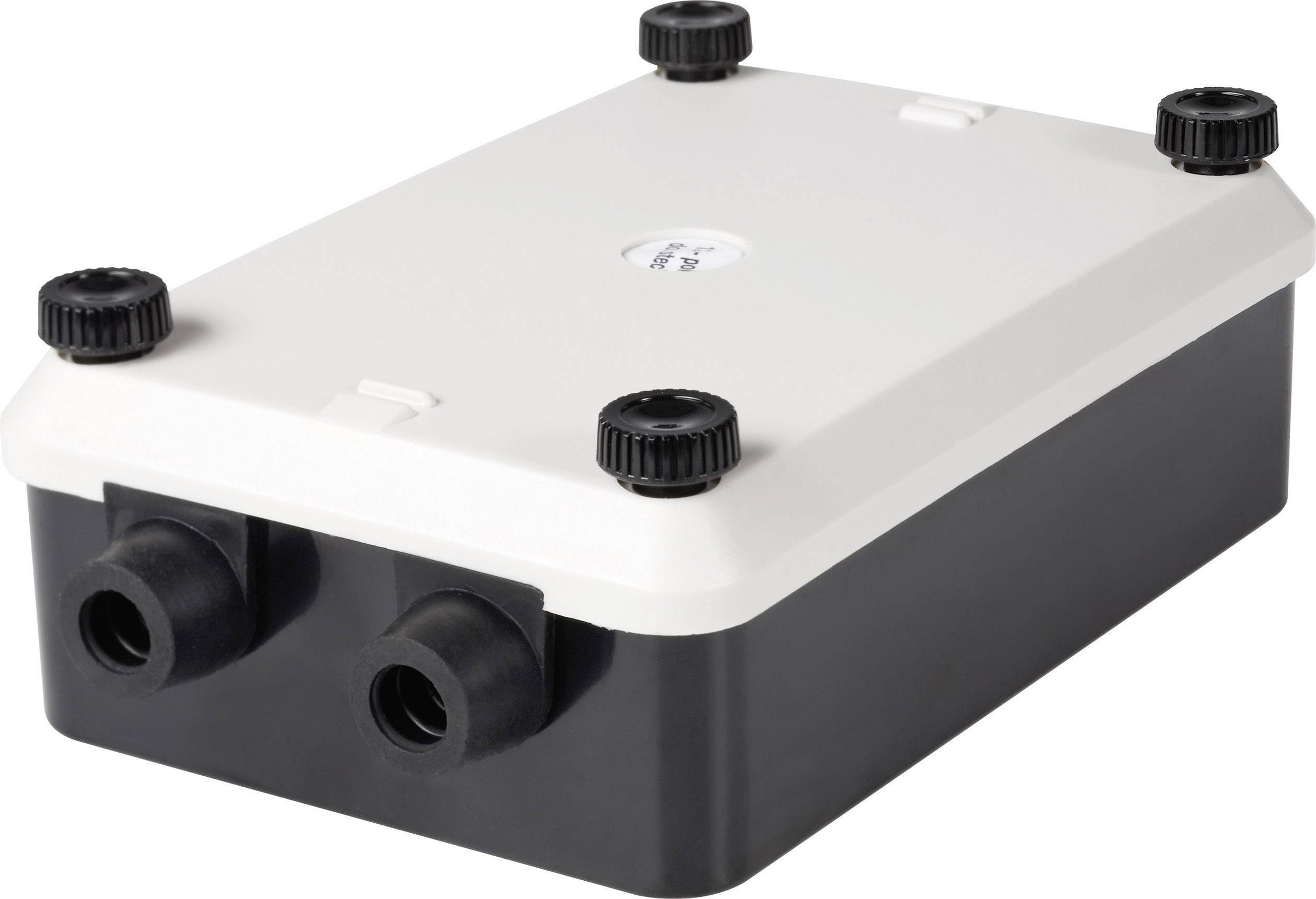 White rectangular box with a black base and four round connections at the corners. Two side connections at the front. Purpose unclear.