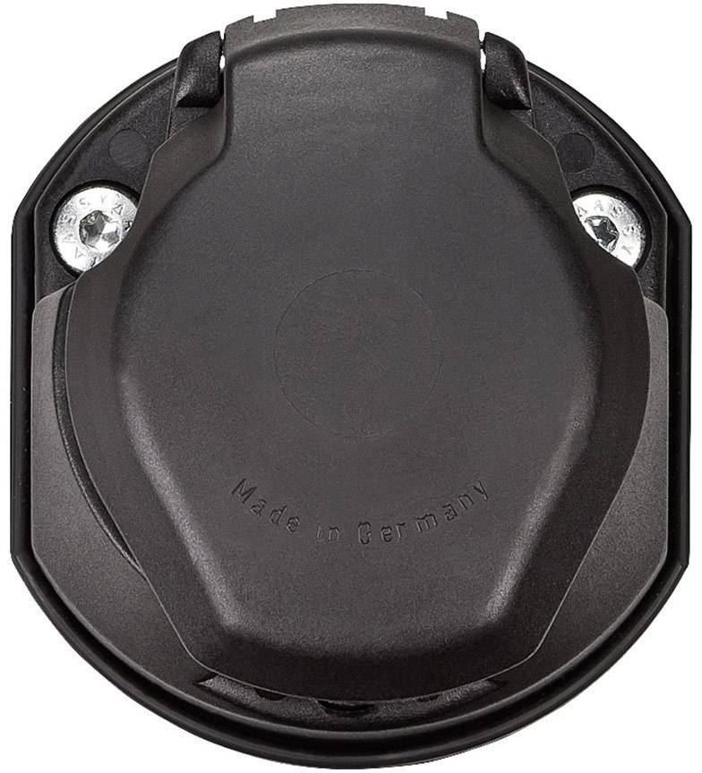 Black round trailer socket with a hinged lid and screws, with 'Made in Germany' printed on the lid.